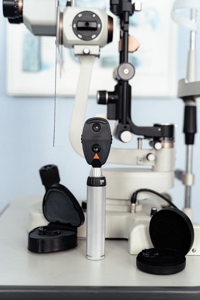 Close-up of ophthalmic equipment for eye exams in a clinical setting.